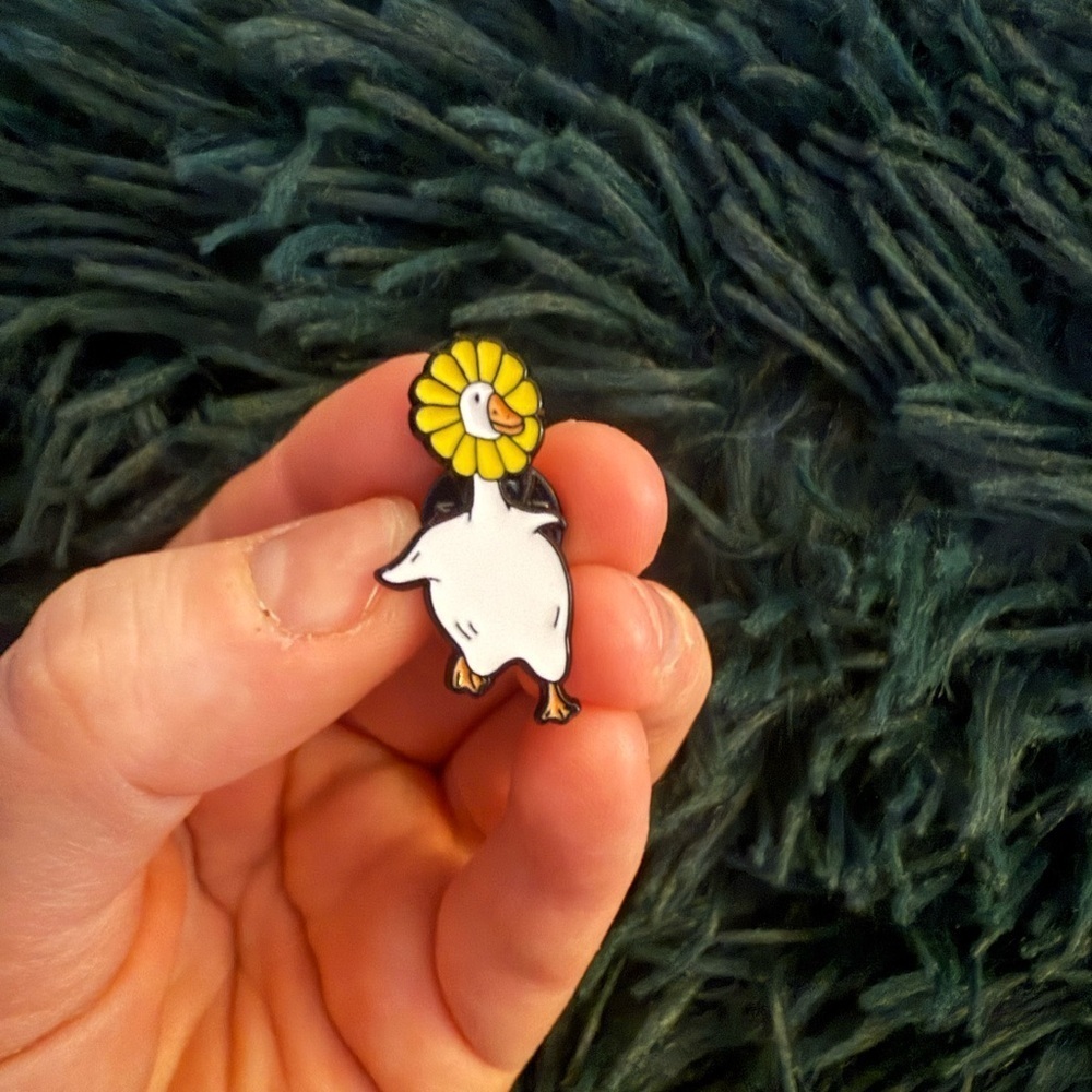 Women’s Accessories Fun Duck Enamel Pin with Yellow Flower- White,Black,&Orange